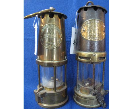 Protector Lamp and Lighting Company Ltd. type 6 brass miner's safety lamp, together with an E. Thomas and Williams Ltd. of Ab