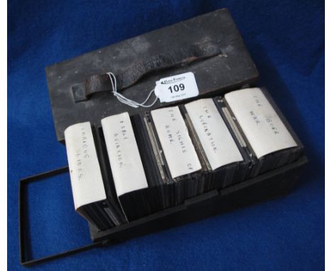 Fitted box of early 20th Century magic lantern slides including: early aviation; the sites of Rome; the Coronation and the Bo