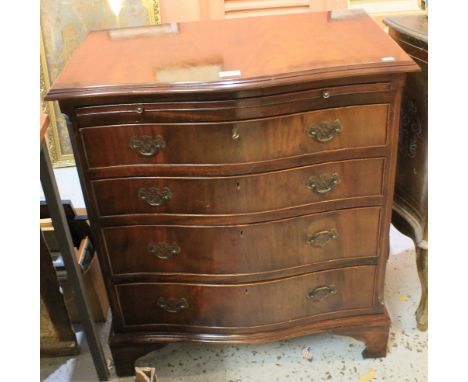 Reproduction mahogany serpentine chest of four long drawers on bracket feet.(B.P. 24% incl. VAT)