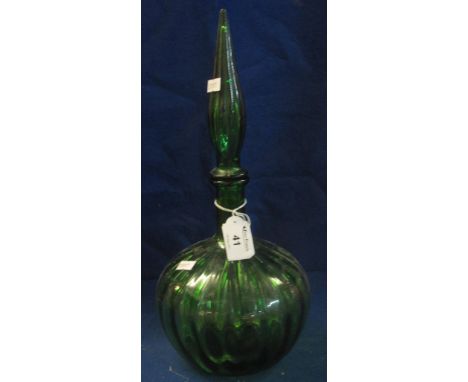 Green glass fluted flask shaped decanter with pointed blown stopper.(B.P. 24% incl. VAT)