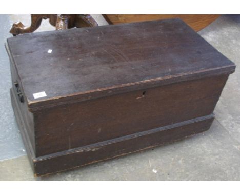 Edwardian stained pine trunk with metal carrying handles.(B.P. 24% incl. VAT)