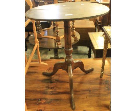 19th Century oak tripod table.(B.P. 24% incl. VAT)