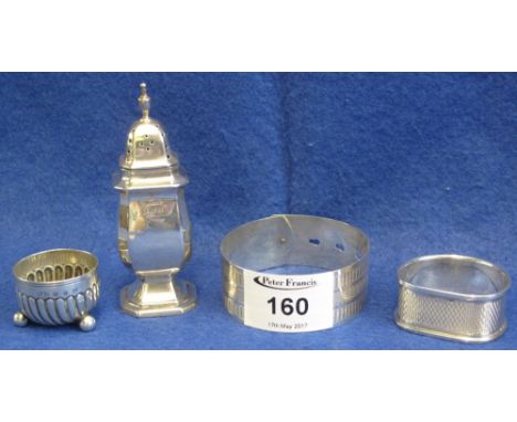 Group of small silver items to include: baluster shaped pepperette with Birmingham hallmark; engine turned silver napkin ring