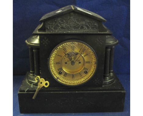 Late Victorian black slate architectural two train mantel clock with gilded Roman face and exposed escapement.(B.P. 24% incl.