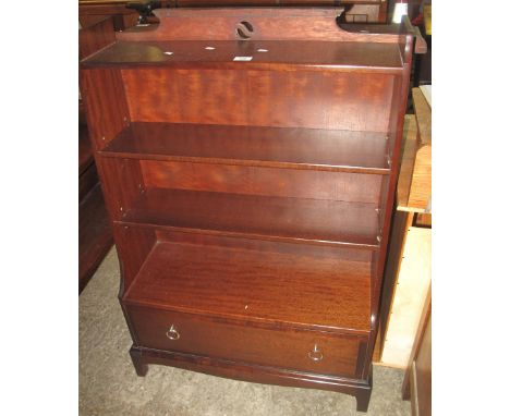 Stag mahogany three section single drawer bookcase on bracket feet.(B.P. 24% incl. VAT)