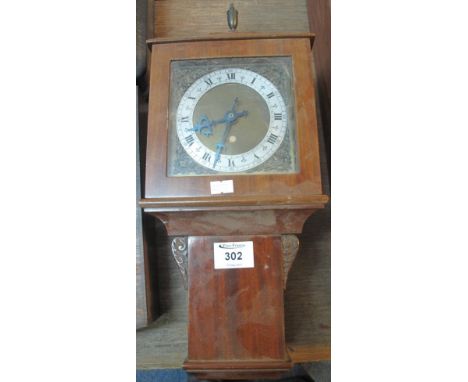Small mahogany cased wall clock with silvered dial and wall bracket.(B.P. 24% incl. VAT)
