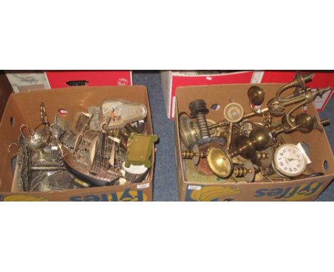 Two boxes of assorted items to include: brass table candelabra; vintage 'Equity' alarm clock; various metalware including: tr