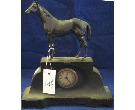Art Deco bronzed spelter mantel clock, surmounted by standing horse and with back winding movement.(B.P. 24% incl. VAT)