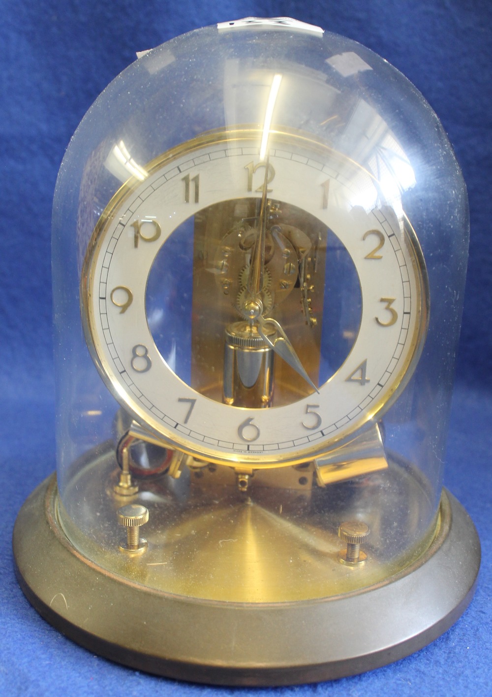 Junghans ATO battery clock with glass dome.(B.P. 24 incl. VAT)