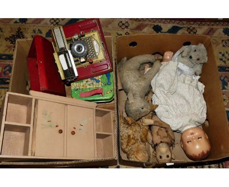 Two boxes of children's toys, to include Merrythought Monkey, large composition headed doll, German-made tinplate typewriter,