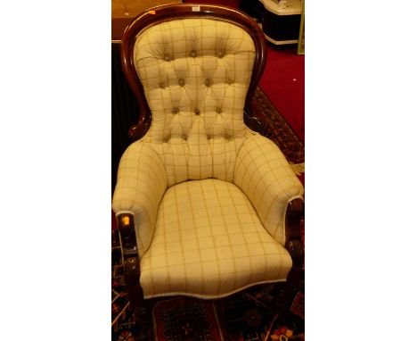 A mid-Victorian mahogany spoonback armchair, with chequered button cream upholstery, w.66cm 