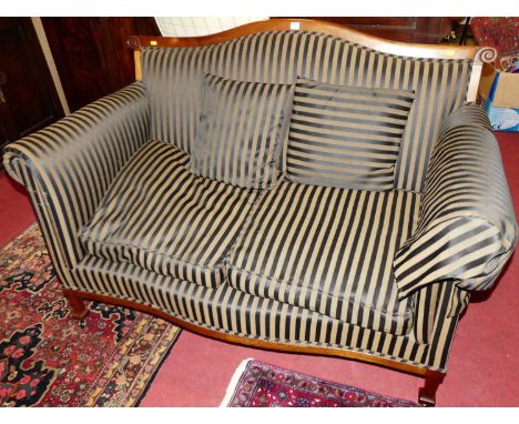 An Edwardian walnut framed and striped re-upholstered two-seater parlour sofa, w.140cm 