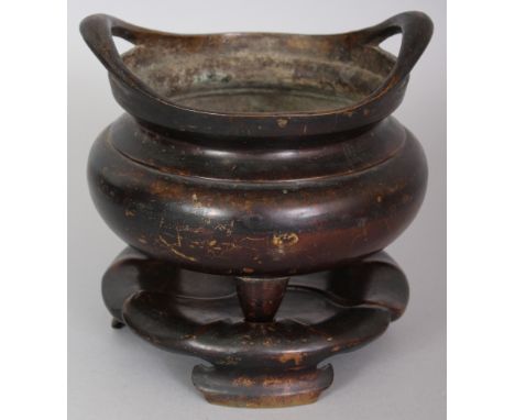 A CHINESE BRONZE TRIPOD CENSER ON STAND, weighing 1.16Kg in total, the base of the censer cast with a six-character Xuande ma
