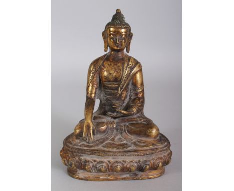 A CHINESE BRONZE FIGURE OF BUDDHA, seated in dhyanasana on a lotus plinth, 8.25in high.