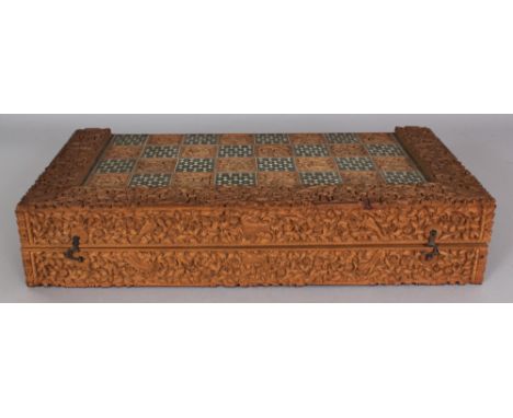 A GOOD QUALITY 19TH/20TH CENTURY INDIAN INLAID FOLDING CHESS & BACKGAMMON BOARD, the exterior with mosaic inlaid squares in i