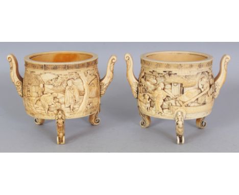 A PAIR OF FINE QUALITY SIGNED JAPANESE MEIJI PERIOD IVORY TRIPOD KOROS, with baku-form scroll handles, the sides finely carve