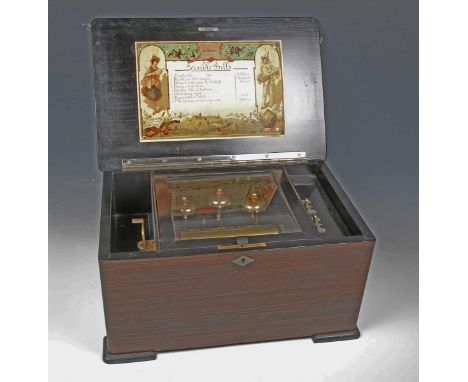 A late 19th century Swiss music box, the lever-wind movement playing eight airs on a 15.5cm cylinder and three bells, the tun