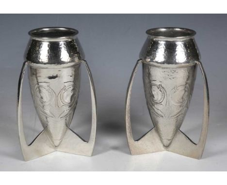 A pair of Liberty &amp; Co 'Tudric' pewter vases, designed by Archibald Knox, model number '0226', each triform base stamped 