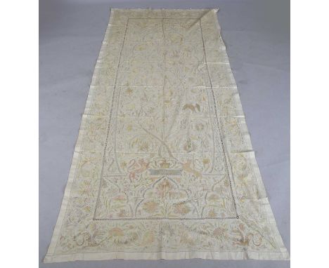 An early 20th century Eastern embroidered silk tablecloth, possibly Indian, finely worked in silks with birds, flowers, folia
