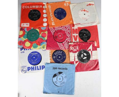 A collection of approximately one hundred and thirty-six 7" records, including singles by The Walker Brothers, The Searchers,