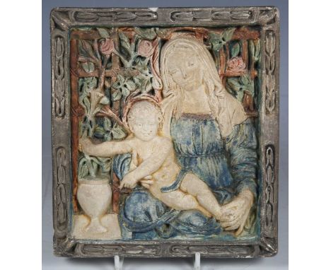 An early 20th century Compton pottery rectangular wall plaque, modelled in relief with the Madonna and Child against a trelli