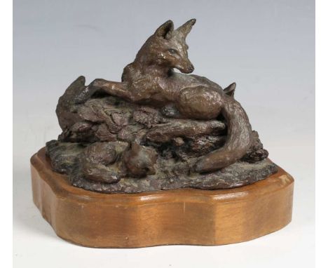 Sheri Nagu - 'Red Fox', a late 20th century American brown patinated cast bronze model group of four foxes, bearing cast sign