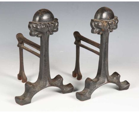 A pair of Arts and Crafts cast iron fire andirons with foliate ball finial, height 30cm.
