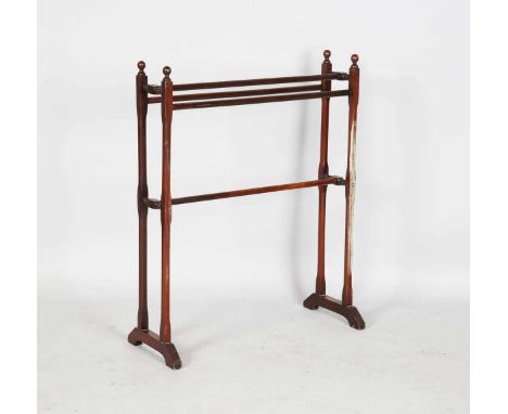 An Edwardian mahogany towel rail, on bracket feet, height 90cm, width 72cm, depth 30cm.