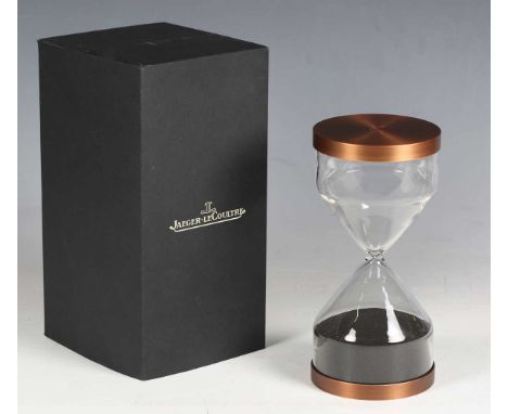 A modern Jaeger-LeCoultre glass and anodized copper sand timer, height 20cm, boxed.