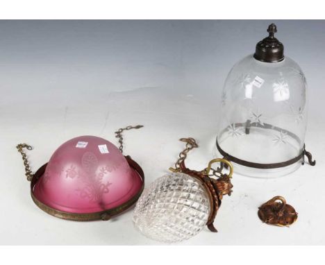 An early 20th century cut clear glass and gilt metal mounted ceiling light, height 20cm, together with two other glass ceilin