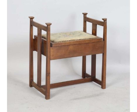 An Edwardian Arts and Crafts mahogany box seat piano stool with inlaid decoration, height 63cm, width 58cm, depth 37cm.