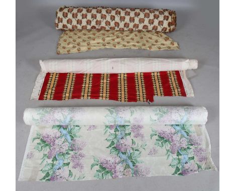 A quantity of upholstery and curtain fabric, including two bolts of 'Ribbon Carnation' pattern waxed cotton by Coles of Morti