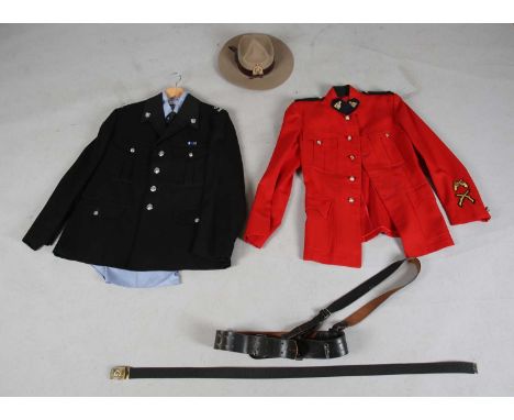 A Royal Canadian Mounted Police uniform, including a Biltmore hat, together with a British police uniform.