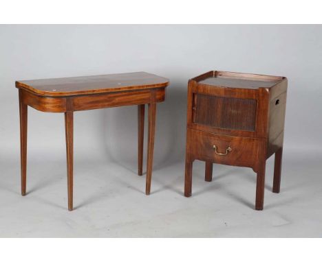 A George IV mahogany bowfront night cupboard with a galleried top and tambour shutter door, height 79cm, width 53cm, depth 46