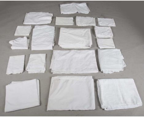 A quantity of 20th century table and bed linen, some with embroidered decoration.