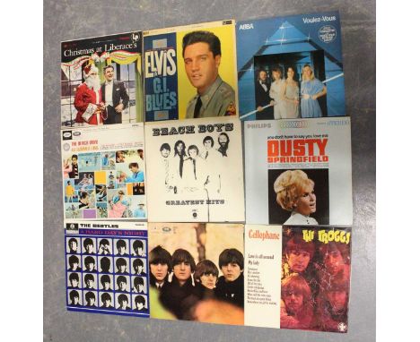 A collection of approximately sixty-nine LP records, including first pressings of 'A Hard Day's Night', 'Beatles for Sale' an