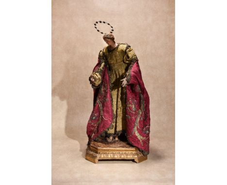 A Neapolitan polychrome painted composition and robed creche figure, probably the Virgin Mary, late 18th/ early 19th century,