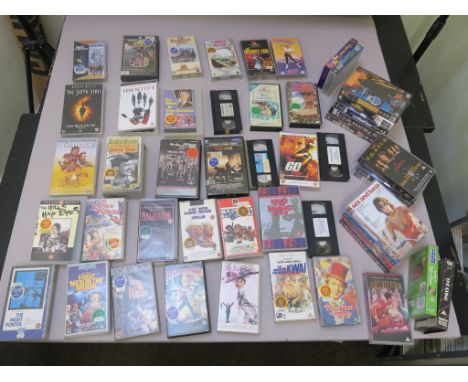 VHS videos direct from Oscars Video following the closure of their store in 2001. Titles include Warner home video rental big
