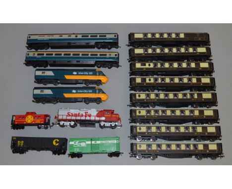 OO gauge: Lima 4-car Inter-City set, two Hornby 4-car Golden Arrow sets and 4 Life-Like items. All unboxed. (16)