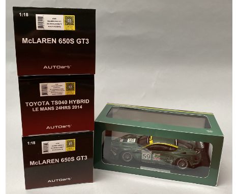 4 AutoArt 1/18 scale diecast model cars. All boxed.CONDITION REPORT: Aston is mint in excellent box. Other 3 sealed inside in