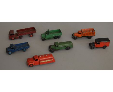 7x Unboxed Dinky Toys models including an Austin Truck and an Esso Petrol Tanker.