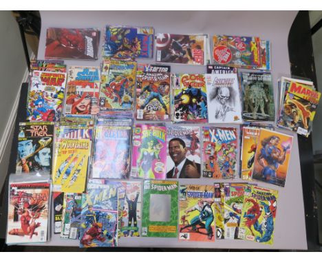 Marvel comics in excellent condition including She-Hulk #1, X-Force 1 (sealed), Star Trek #1, Spider-man #26 (foil cover), Ma