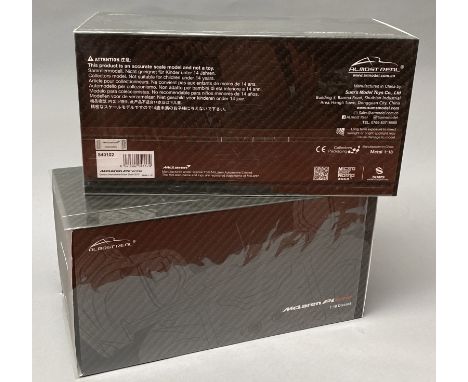 2 Almost Real 1/18 scale McLaren P1 GTR diecast model cars. Both boxed. (2)CONDITION REPORT: both mint and sealed inside as a