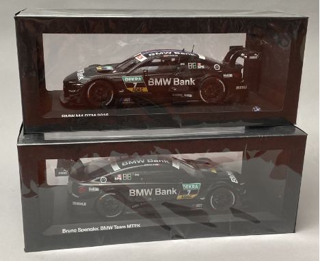 2 BMW 1/18 scale model cars. Both boxed.