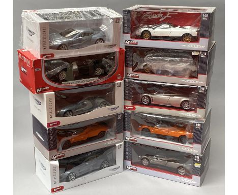10 Mondo Motors 1/18 scale diecast model cars including Pagani examples. All boxed.