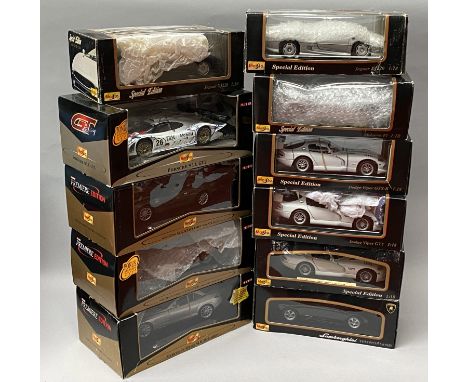 11 assorted Maisto 1/18 scale diecast model cars. All boxed.
