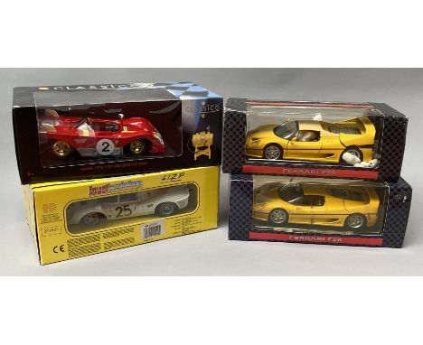 4 Ferrari 1/18 scale racing car models. All boxed.