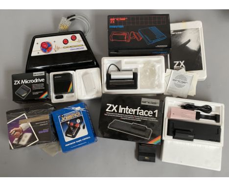 Selection of retro games console / personal computer accessories including a Sinclair ZX Microdrive, Sinclair ZX Printer and 