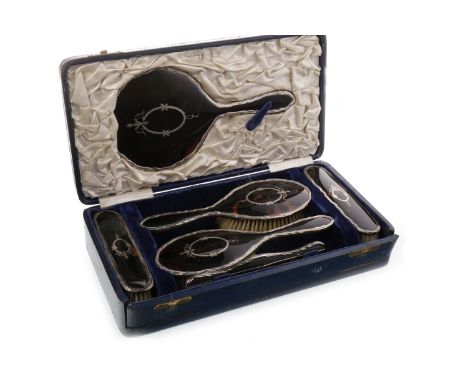 SILVER TORTOISESHELL SIX PIECE VANITY SET, maker E S Barnsley &amp; Co, Birmingham 1918, comprising two hair brushes, two clo