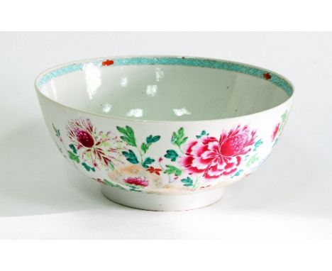 A late 18th Century Chinese bowl, the exterior painted garden landscapes, chrysanthemums, etc., 25.5cm diameter
 Condition Re